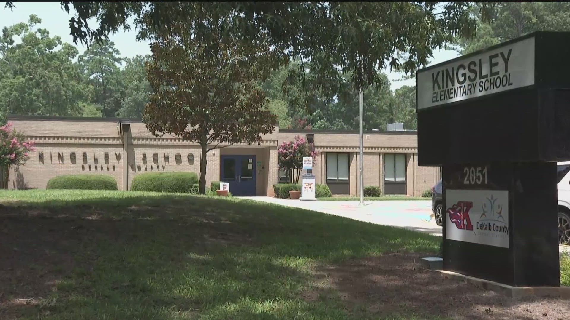 Exterior of Kingsley Elementary School in Naperville, Illinois surrounded by trees and landscaped grounds