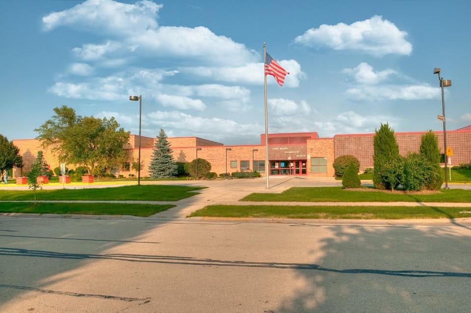 Exterior view of River Woods Elementary School in Naperville, IL, located near the DuPage River.