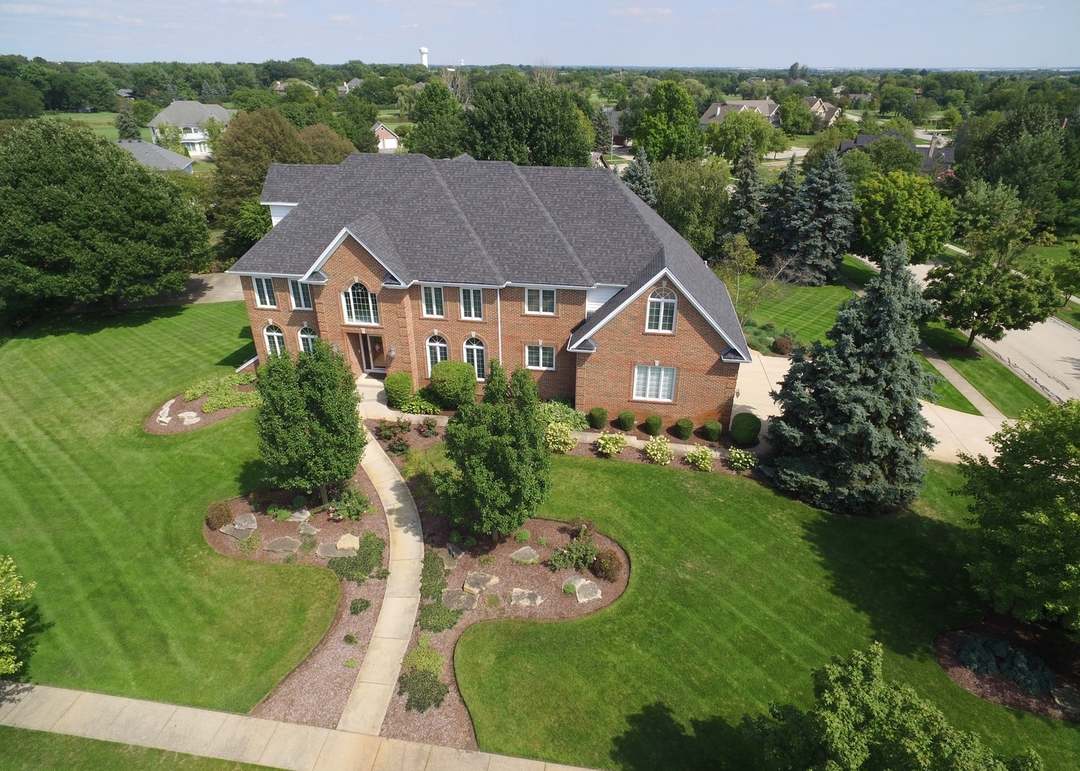 Neighborhoods 9 Aerial view of a large brick home in Burnham Point neighborhood in Naperville Illinois