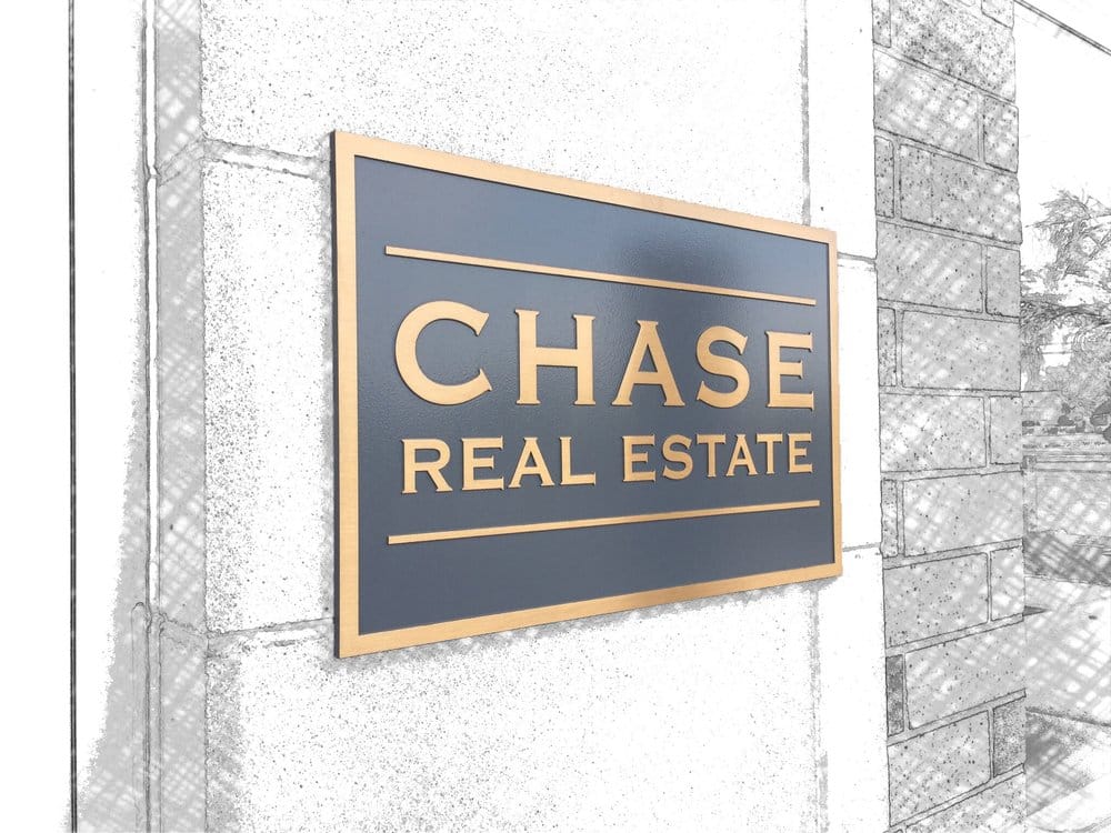 Chase Real Estate sign on an exterior wall in Naperville, Illinois