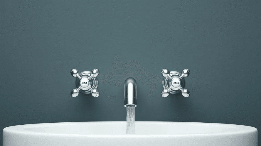 Bathroom faucet with running water for Elevation Plumbing Co plumbing services in the Naperville area.