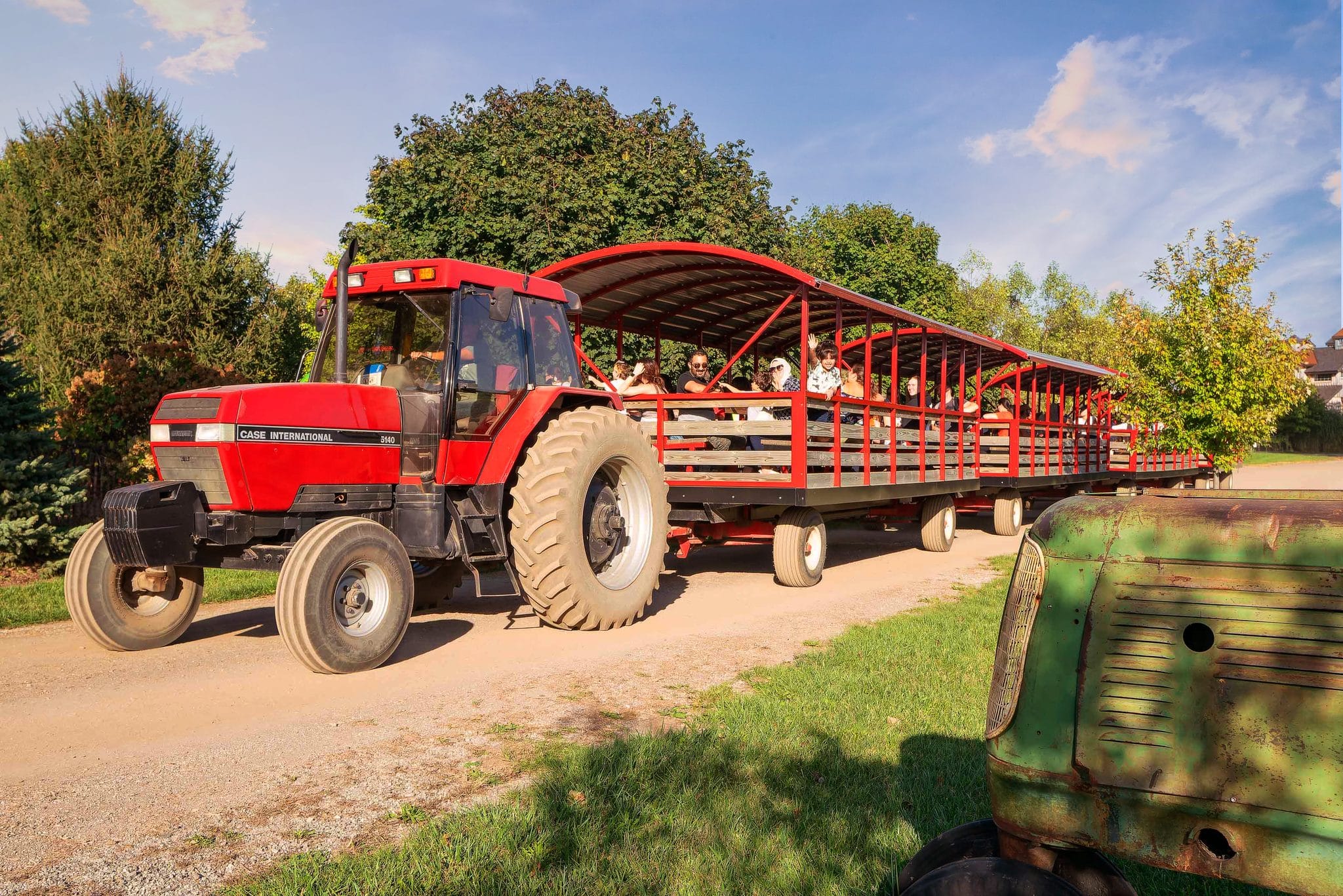The tractor pulled hayrack ride along the trail at Bengtson's Pumpkin Farm