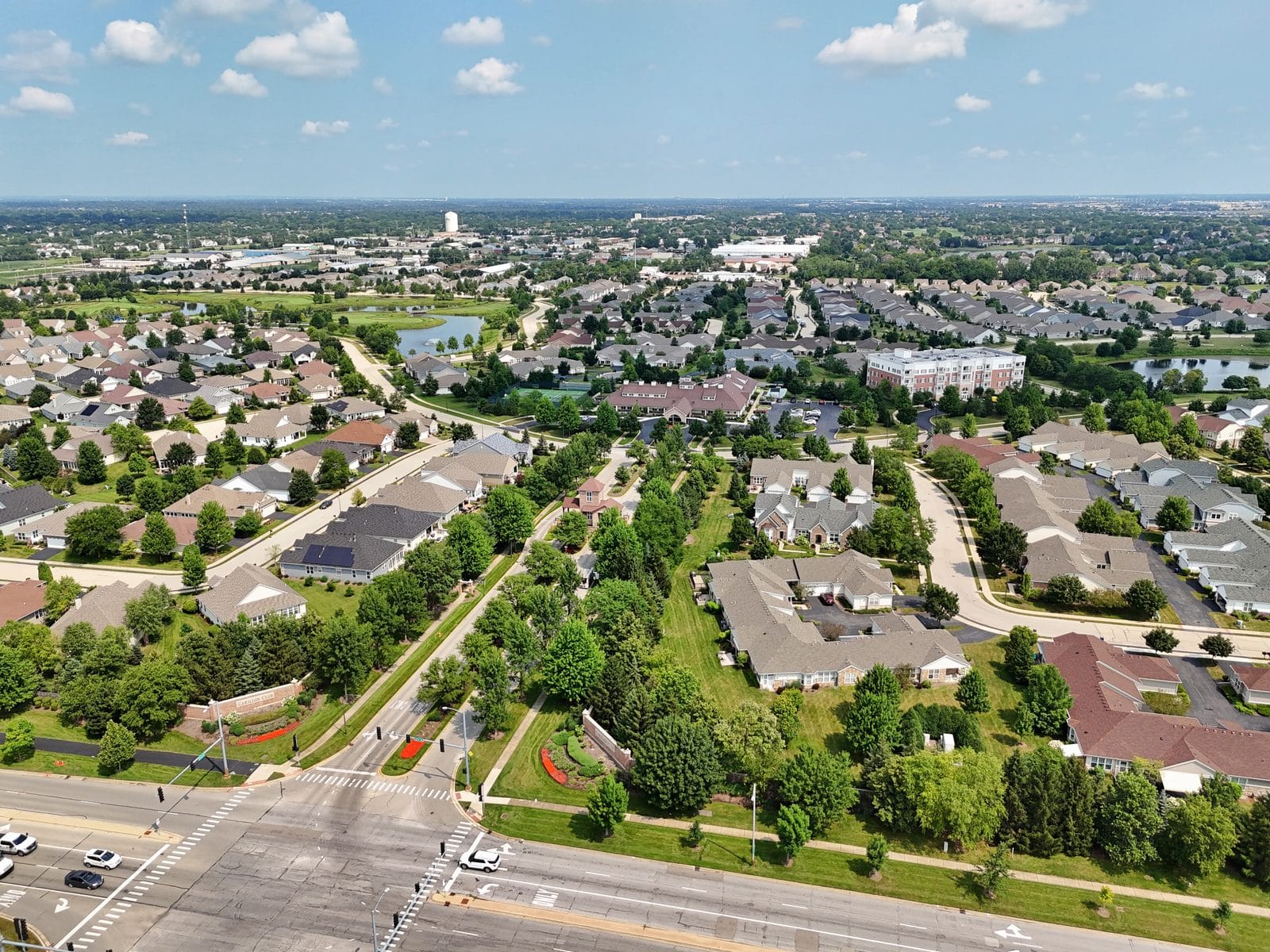 Carillon Club, Aerial View of a Naperville 55+ Active-Adult Community Aerial view of Carillon Club in Naperville with ranch homes, condos, and community ponds