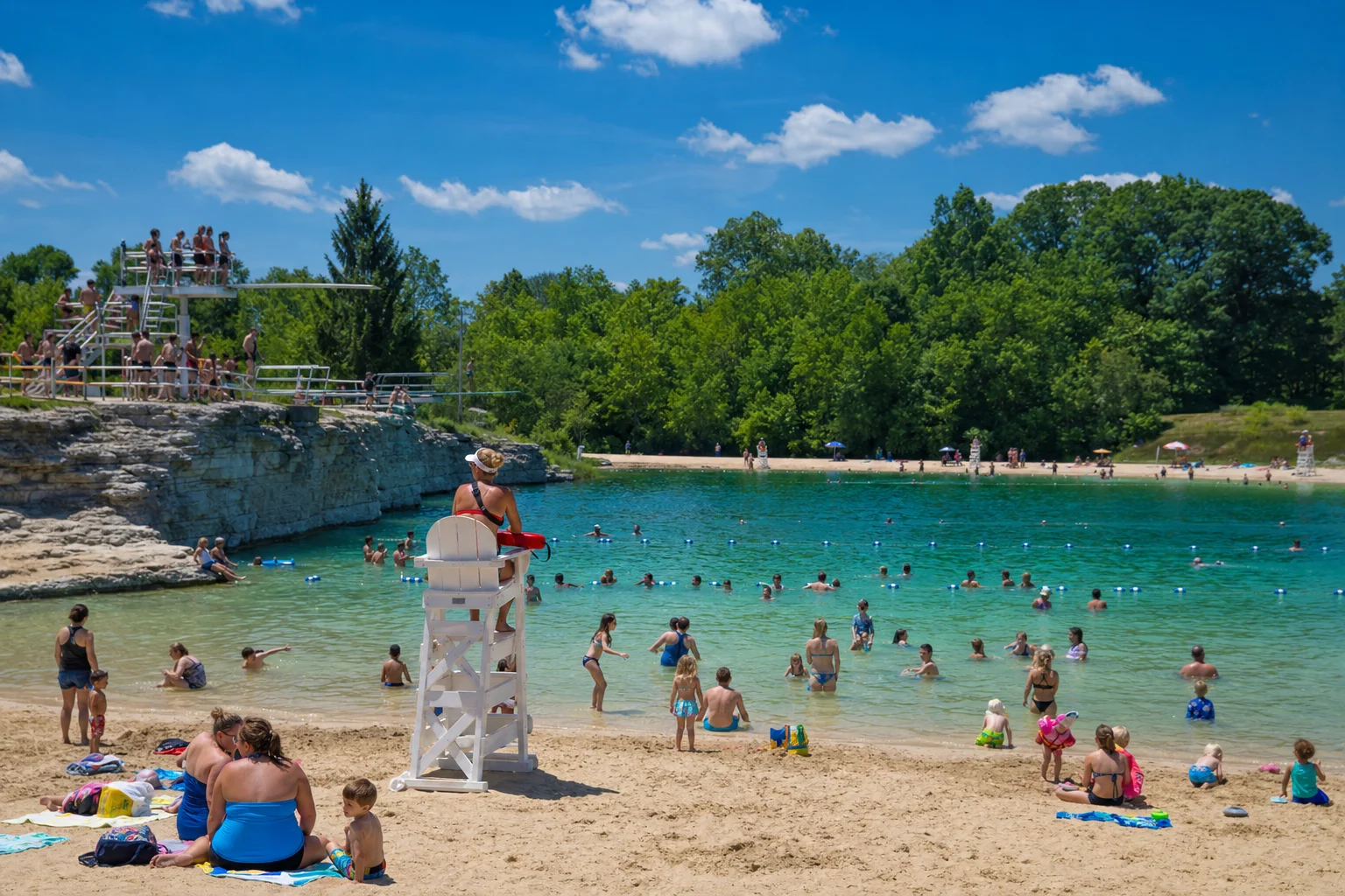 Swimmers cooling off at Centennial Beach in Naperville during July 2026 summer heat