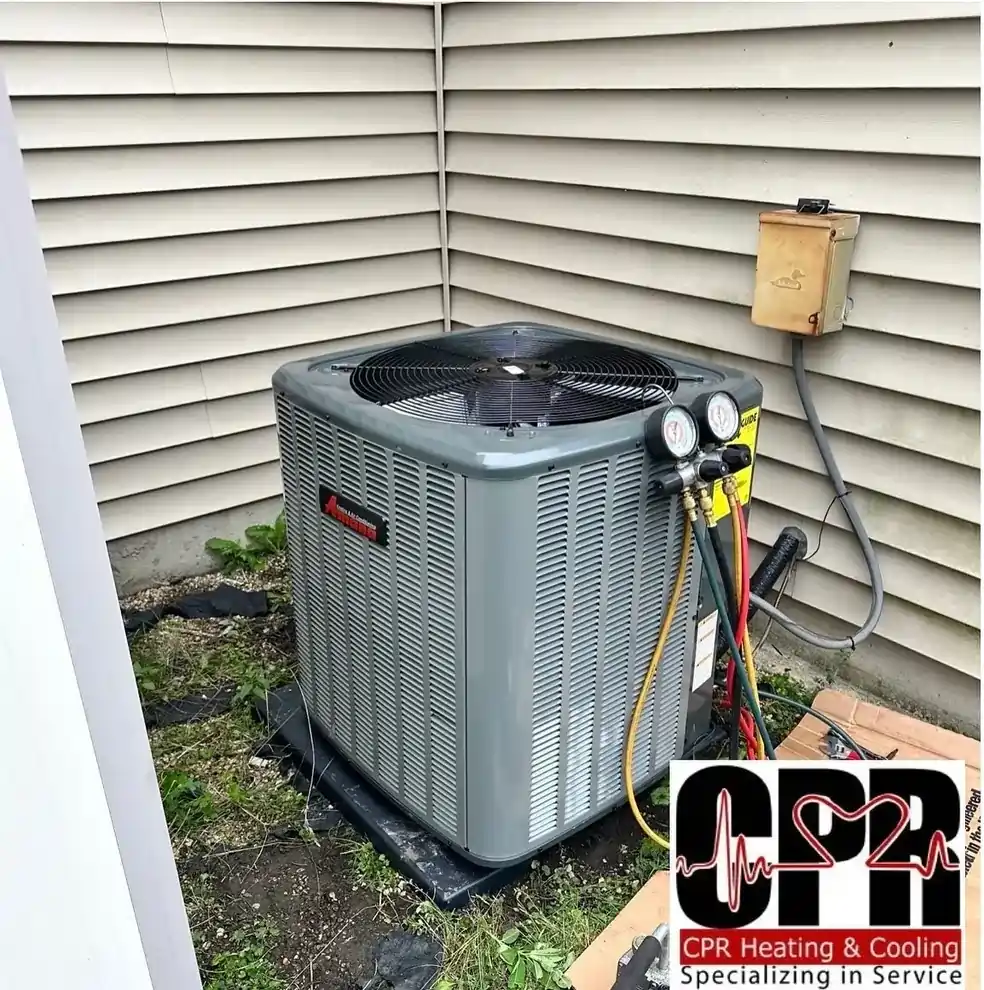 Outdoor air conditioning unit with service gauges representing CPR Heating & Cooling Inc HVAC service in the Naperville area.
