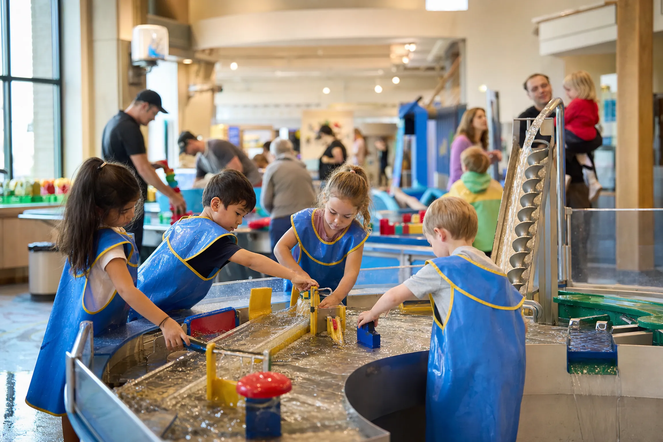 Young children exploring hands-on water exhibits at the DuPage Children's Museum in Naperville 2026