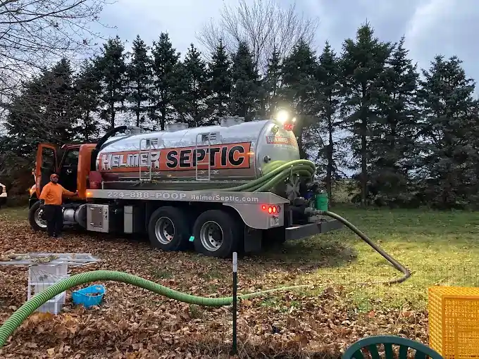 Helmer Septic truck performing septic tank pumping service near Naperville Illinois