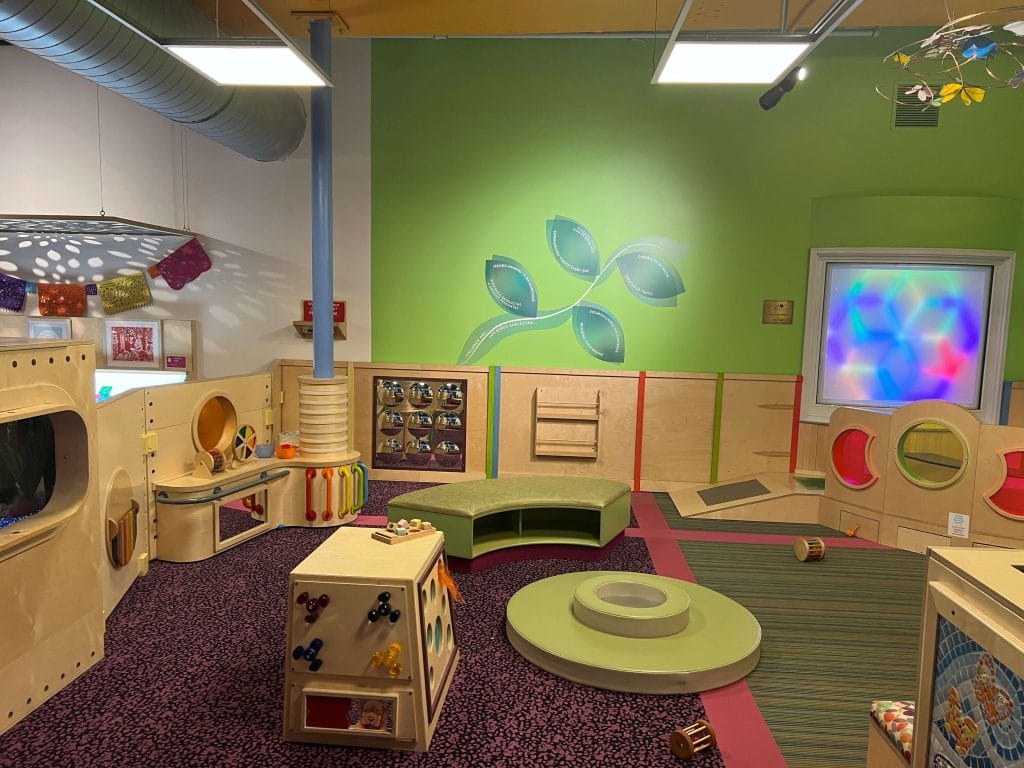Interactive early learning play area inside DuPage Childrens Museum in Naperville, Illinois, featuring hands on exhibits for young children and family activities in Naperville