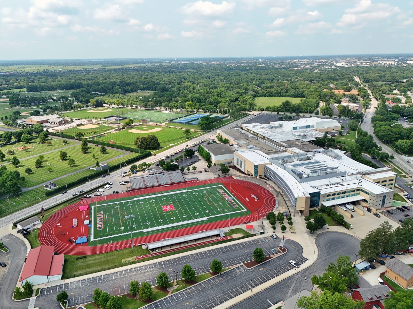 Aerial view of the Naperville Central High School campus and stadium in Naperville School District 203.