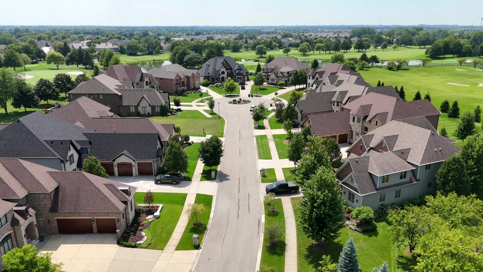 Detached houses, not attached condos or townhomes, on a White Eagle cul-de-sac in Naperville