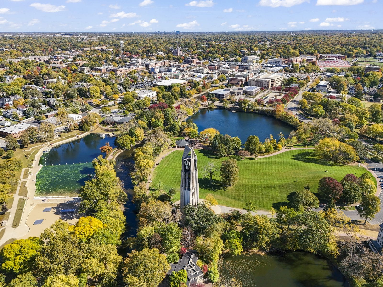 Millennium Carillon and the Naperville Riverwalk, Aerial View in Fall Fall aerial view of the Millennium Carillon, Riverwalk lakes, and Rotary Hill in Naperville