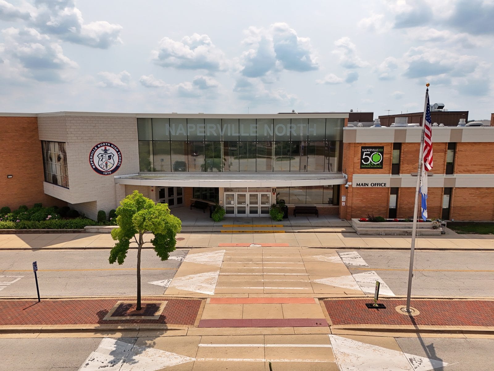 Naperville School District 203 vs 204: A Home Buyer's Guide (2026) 1 Aerial view of Naperville North High School in Naperville School District 203