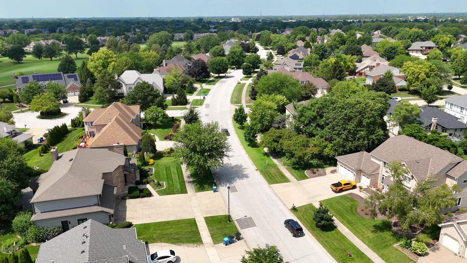 Ranch Homes in Naperville: How to Search, Verify and Inspect 1 Finding Naperville ranch homes: drone view of detached homes along a curving street