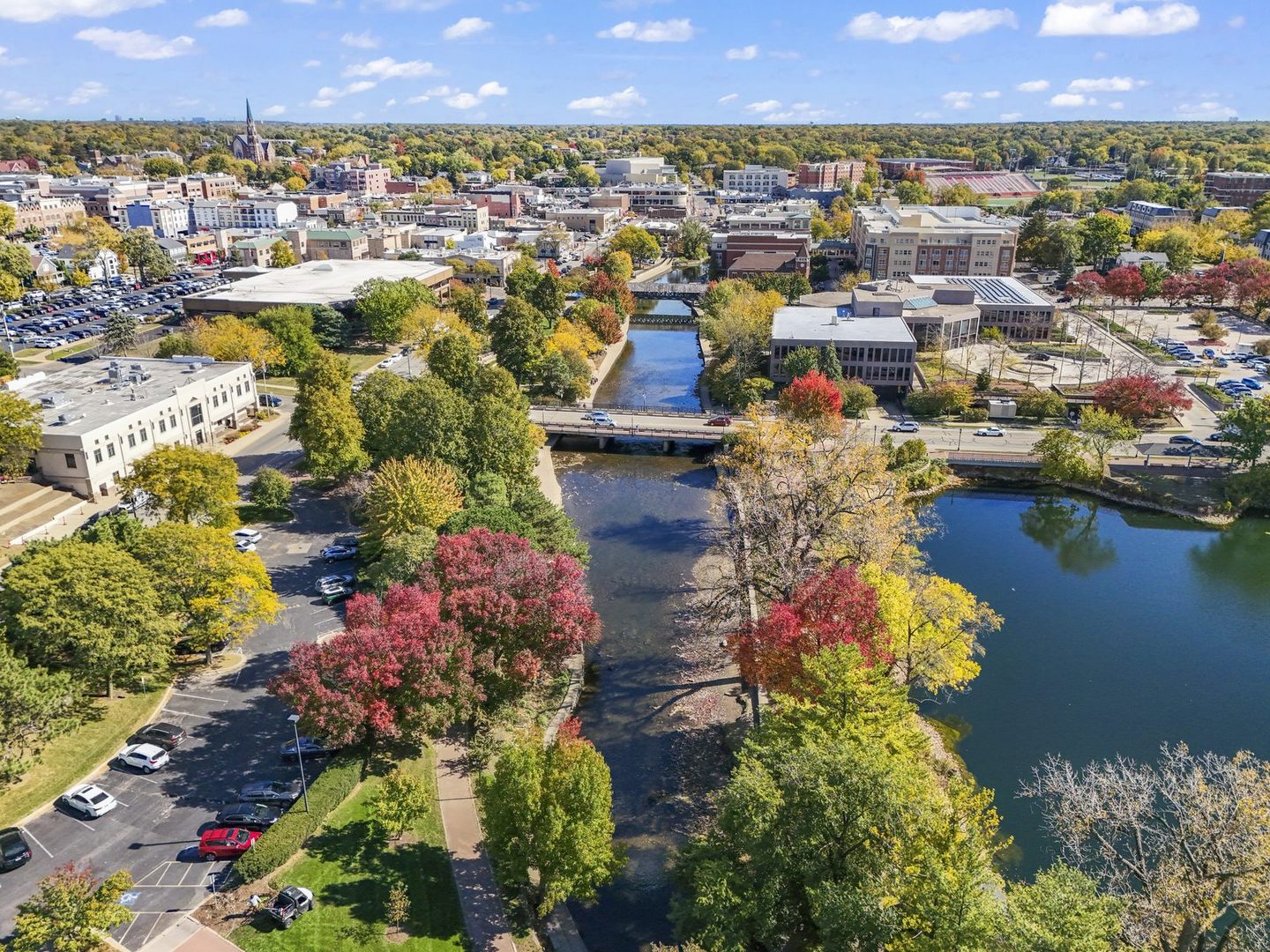 Naperville Halloween and Fall Events 2026: Things to Do Oct 10 to Nov 5 6 DuPage River and Riverwalk lined with red and gold fall trees in downtown Naperville