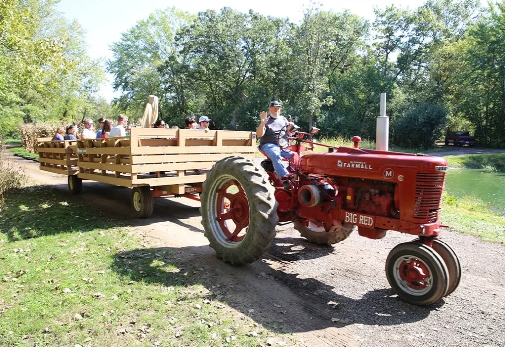 Red tractor hayride at Sonny Acres Farm near Naperville in 2026