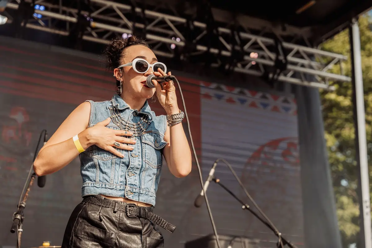 Live Latin music stage at Tacoville Naperville 2026 summer festival Naper Settlement Illinois June