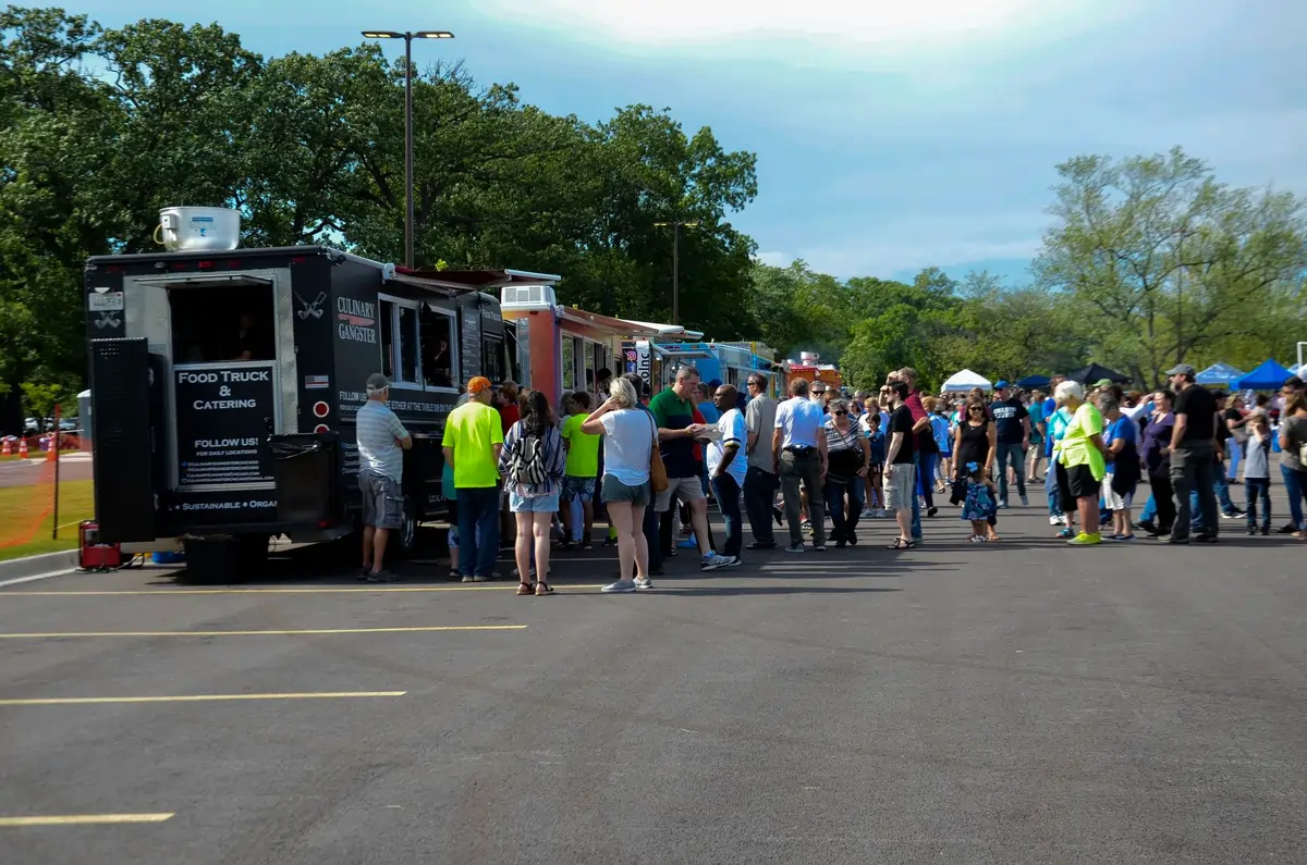 Colorful taco and street food vendors at Tacoville Naperville 2026 festival at Naper Settlement Illinois