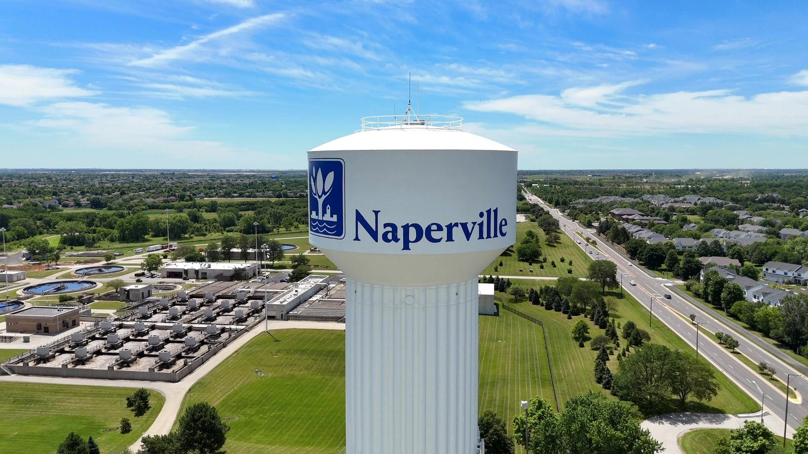 Buying a Home in Unincorporated Naperville: Outside the City Limits 1 Aerial of a Naperville water tower, contrasting public water with wells in unincorporated Naperville