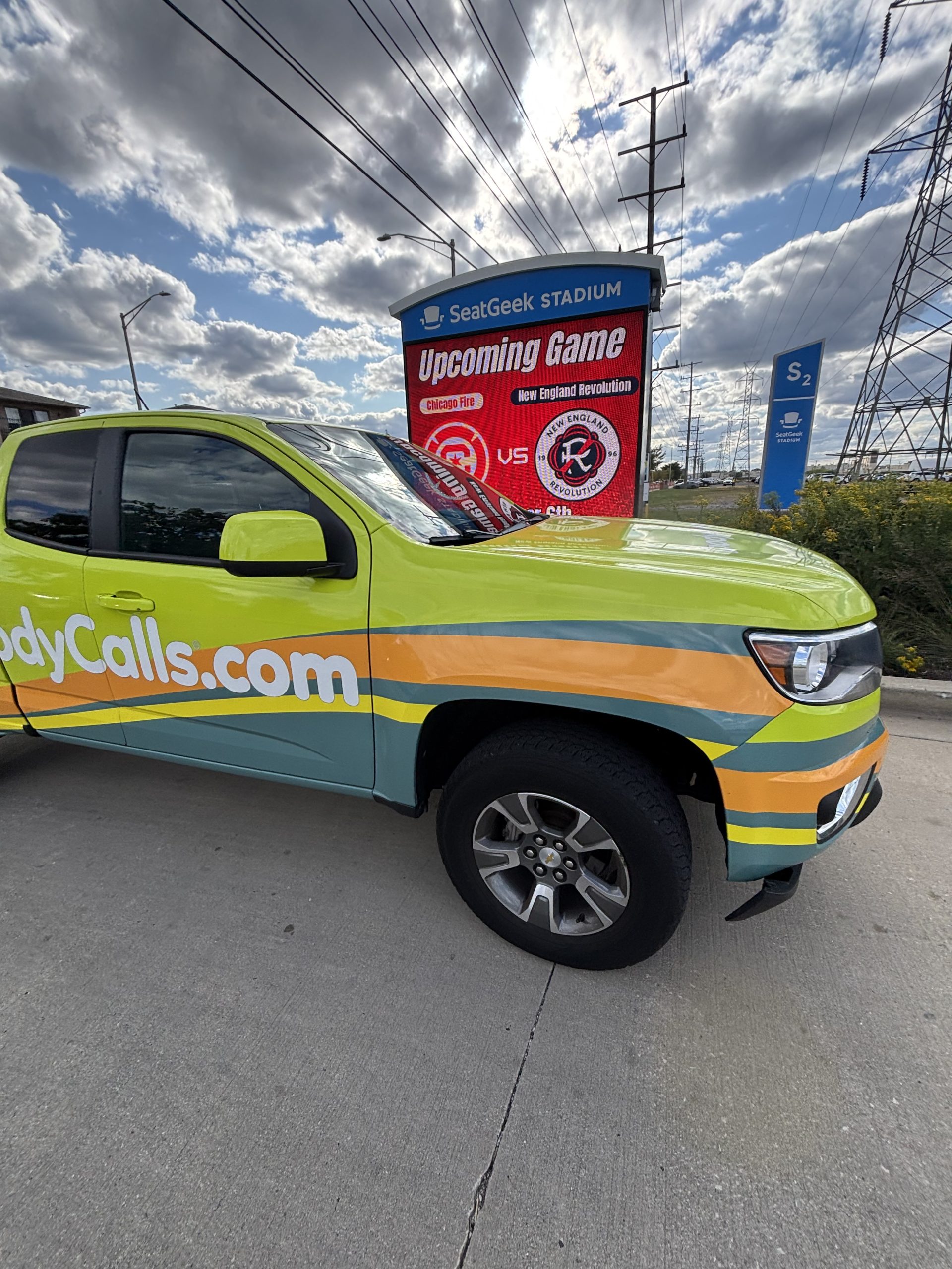DoodyCalls Chicagoland branded service truck providing pet waste removal services in Naperville, Illinois.